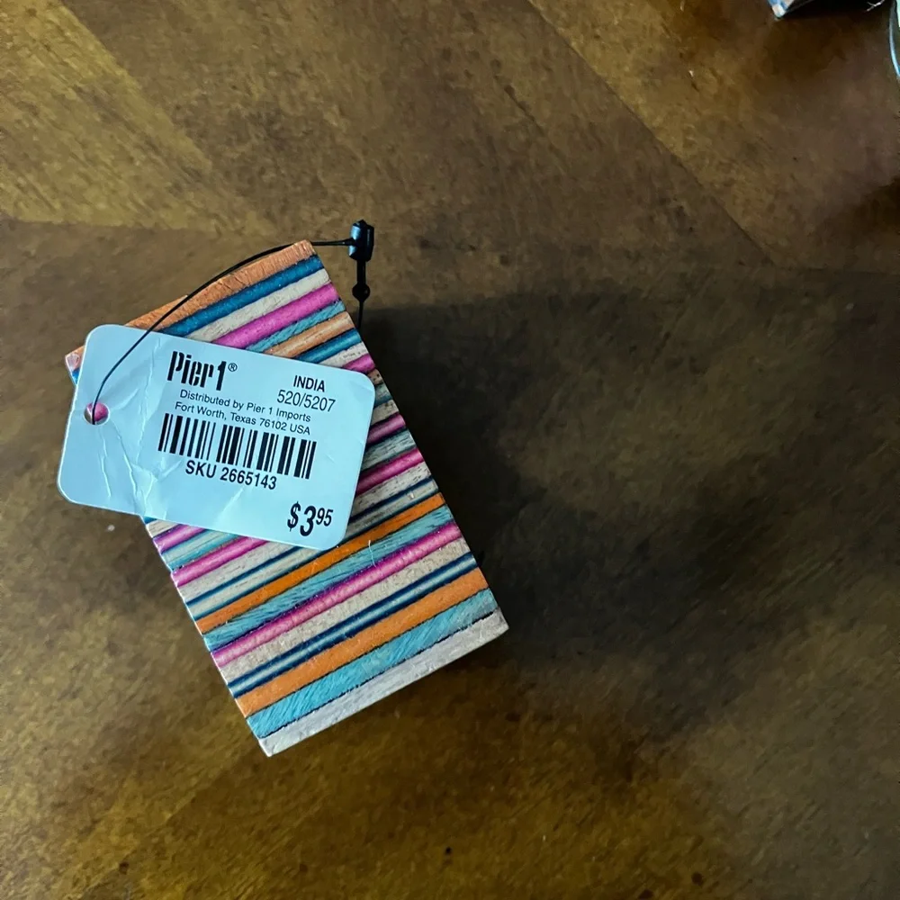 Set of 8 Multicolored Striped Wooden Napkin Rings. Napkin is not included.